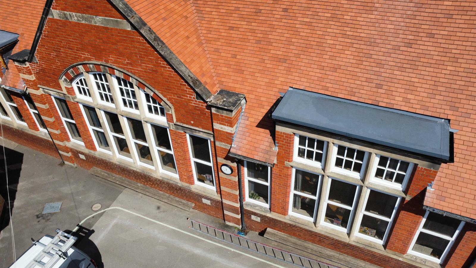 Flat Roof Dormers in Pitched Tiled School Roof